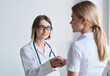 © SHOTPRIME STUDIO - Woman doctor medical gown female patient glasses health lifestyle