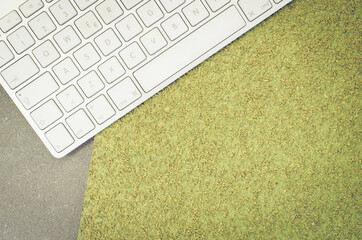 Wall Mural - Top view of a computer keyboard on an office desk with copy space