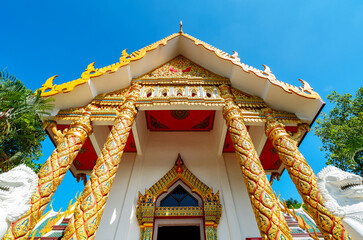 Wall Mural - The beautiful Thai Buddhist temple is a holy place for the Thai people.