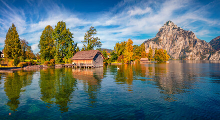 Wall Mural - Exciting morning view of Traunsee lake with Traunstein peak on background. Majestic autumn scene of Austrian alps, Europe. Traveling concept background.