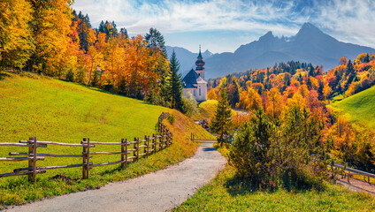 iconic picture of bavaria with maria gern church with hochkalter peak on background. sunny autumn sc