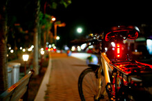 Bicycle In The Side Road At Night