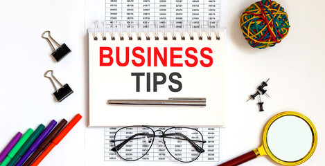 Poster - Debt BUSINESS TIPS on a charts with office tools