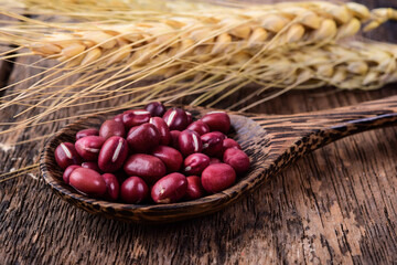 Wall Mural - Red beans in wood spoon on wooden