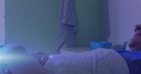 Poster - Streaks of light against male patient lying on hospital bed