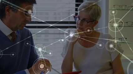 Poster - Network of connections against male doctor talking to senior woman