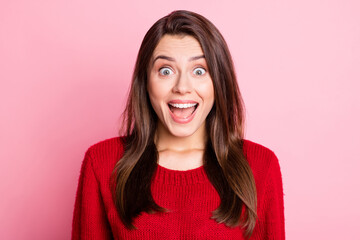 Wall Mural - Portrait photo of amazed happy surprised brunette girl staring with opened mouth smiling wearing knitted sweater isolated on pink color background