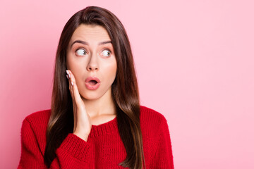 Sticker - Photo portrait of surprised astonished girl looking at side with opened mouth touching face wearing red casual clothes isolated on pink color background