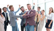 © ASDF - creative team congratulating their leader. success concept