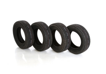 Poster - Stack of car tires isolated on a white background