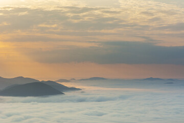Wall Mural - beautiful sunrise in the carpathian mountains with fog and dramatic sky
