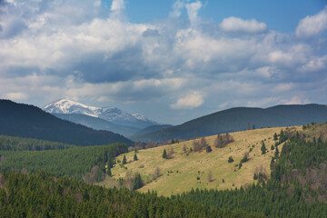 Wall Mural - beautiful sunrise in the carpathian mountains with fog and dramatic sky