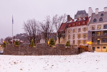 17th Century Royal Battery And Historic Buildings On Place De Paris Covered In Snow In The Petit-Champlain Sector Seen During A Grey Winter Morning, Quebec City, Quebec, Canada