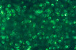 green glitter texture background. Selective focus.Dark emerald