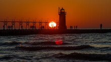 Sunset On Lake Michigan In South Haven On The North Pier.