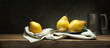 © fabiomax - Three pears on old wooden table in vintage setting with cutlery, plate and pewter mug, space for text.