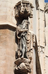 Canvas Print - Statue of a saint in La Lonja monument. Palma de Mallorca, Spain