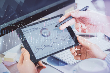 Aufkleber - Double exposure of man's hands holding and using a phone and financial chart drawing. Market analysis concept.