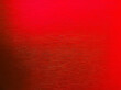 © WONGSAKORN - red brushed metallic aluminum texture background. abstract technology concept background. interior metal laminated material background.