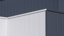Low Angle And Side View Of Gray And White Corrugated Metal Factory Building Wall In Perspective View