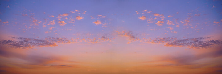 Wall Mural - beautiful background of the evening blue sky with colorful clouds. purple red orange sunset. wide ba