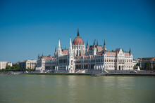 Hungarian Parliament In Budapest By Danube.
