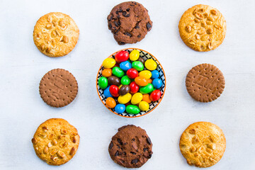 Cookies and MM Dems on the white background, sweet pastry dessert