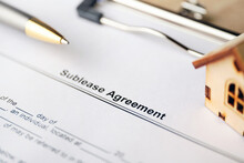 Legal Document Sublease Agreement On Paper Close Up.