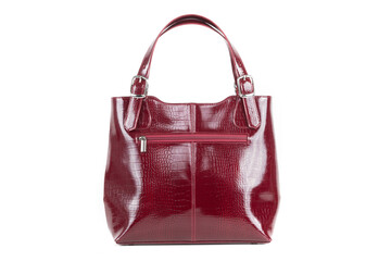 red stylish ladies leather bag on a white background, back view