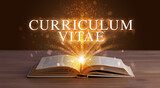 Fototapeta Uliczki - CURRICULUM VITAE inscription coming out from an open book, educational concept