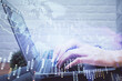 © peshkova - Multi exposure of woman hands typing on computer and forex chart hologram drawing. Stock market analysis concept.