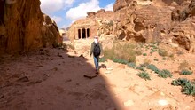 Hikking Along The Trail Of Umm Al Biyara, In The Nabatean City Of Petra, Jordan.