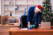 © Elnur - Employee in the office during christmas party