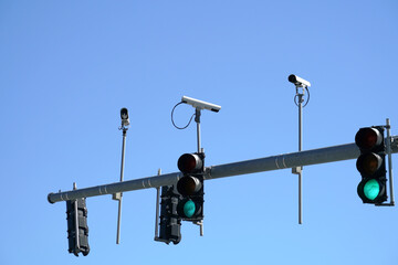 Wall Mural - Traffic light and surveillance camera