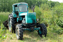 Old Blue Tractor. Old Tractor For Agricultural Work