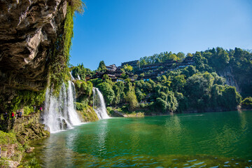 Wall Mural - The Wangcun Waterfall at Furong Ancient Town. Amazing beautiful landscape scene of Furong Ancient Town (Furong Zhen, Hibiscus Town), China