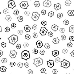 Wall Mural - Black Animal health insurance icon isolated seamless pattern on white background. Pet protection concept. Dog or cat paw print. Vector.