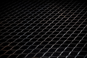 black metal grill background closeup