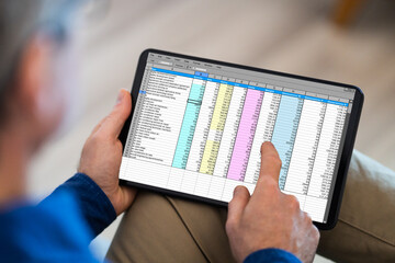 Poster - Man Holding Tablet