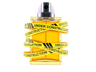 Canvas Print - Perfume bottle with under construction tape