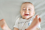 Fototapeta  - Happy toddler baby smiling