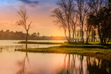 Fototapeta Łazienka - Nice landscape with tree and lake on sunrise or sunset in autumn.
