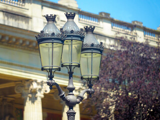 Wall Mural - Old lantern. Street lighting, lantern against the background of cityscape of Paris, France. View of Paris