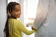 © NDABCREATIVITY - Pediatrician doctor smiling with his little girl patient at hospital