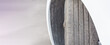 Badly worn out car tire tread and damaged bulb like side due to wear and tear or because of poor tracking or alignment of the wheels, dangerous for driving unsafe not safe for use copy space.