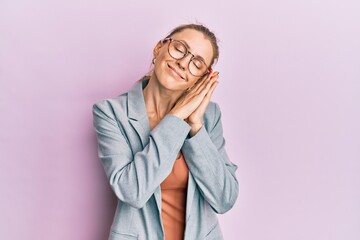 Poster - Beautiful caucasian woman wearing business jacket and glasses sleeping tired dreaming and posing with hands together while smiling with closed eyes.