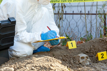 crime scene investigation. forensic science specialist working on human remains identification.