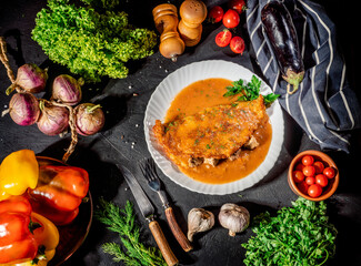 Poster - Potato pancakes with meat, vegetable, tomato and parsley on dark background