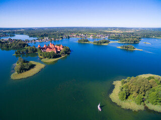 Wall Mural - Aerial view of beautiful Gothic style red brick castle on an island on Galve Lake, Trakai, Lithuania