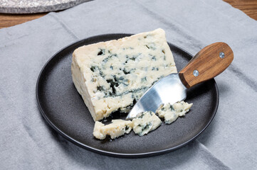 Wall Mural - Cheese collection, French blue cheese roquefort from grotten of Roquefort-sur-Soulzon, France